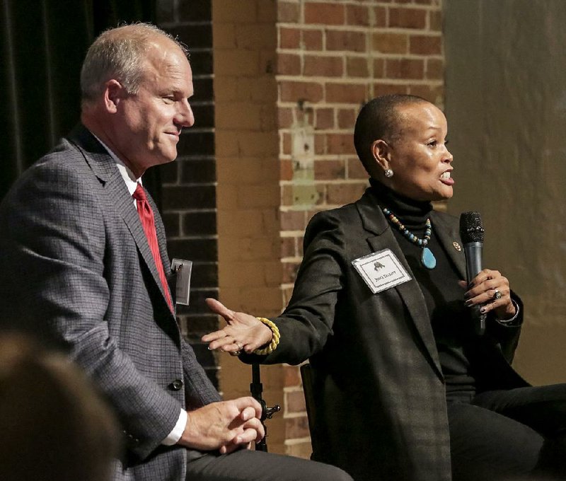 State Sens. Jim Hendren and Joyce Elliott discuss race relations during a meeting of the Political Animals Club on Wednesday afternoon at Union Station in Little Rock. The pair have been working on finding a way for the Legislature to give more attention to the issue. 