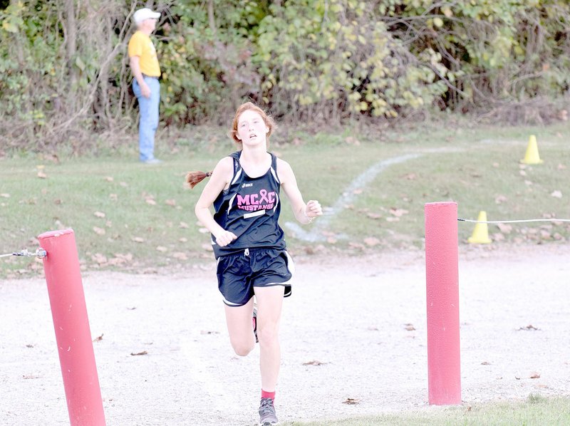 Photo by Rick Peck McDonald County's Addy Mick earned first team Big 8 All-Conference with a fifth place finish at the conference cross country championships held Oct. 12 at Cassville High School.