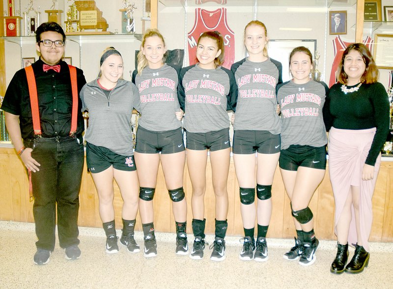 Photo by Rick Peck Senior members of the McDonald County High School volleyball team were honored prior to the Lady Mustangs match against East Newton on Oct. 10 at MCHS. Show are, from left, Hector Moreno (manager), Raye Pearcy, Madison Hall, Karla Barreda, Megan Wofford, Hollie Garvin and Sulma Perez (manager).