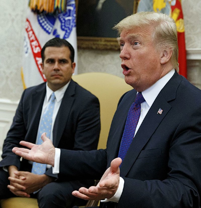 During a visit Thursday in the Oval Office with Puerto Rico Gov. Ricardo Rossello, President Donald Trump said rebuilding the island’s power infrastructure will take “a while.” He said the island now has “massive numbers” of generators that he sent. 
