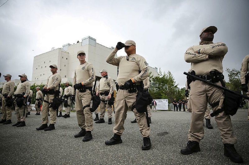 Florida Highway Patrol troopers line up in front of the venue on the University of Florida campus in Gainesville ahead of white nationalist Richard Spencer’s speech on Thursday.