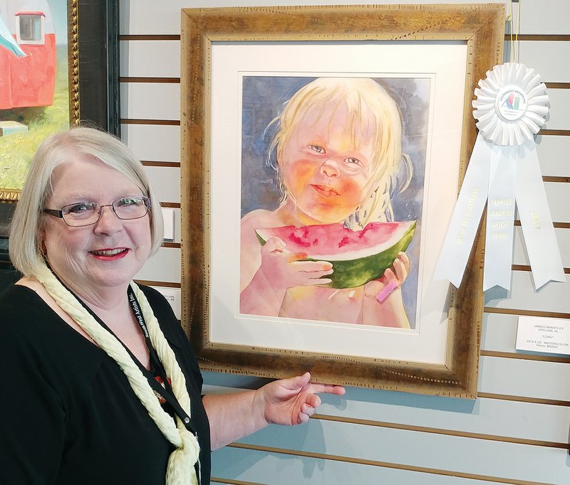 Marlene Gremillion of Hot Springs Village won the Van Wolf Arkansas Artist Award in the third annual Art of the Heartland National Exhibition at the Mena Art Gallery. She won the award with this watercolor, Melon Glow.