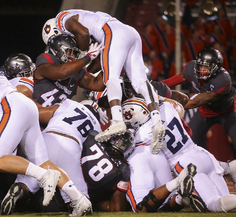 Arkansas’ fourth-down stop of Auburn’s Kerryon Johnson inside the 5-yard line was one of the Hogs’ few defensive highlights.