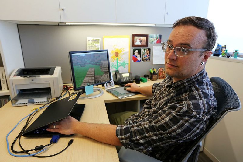 Mark Barnes, a professor at the University of Arkansas-Pulaski Technical College, uses the video game Minecraft to demonstrate urban planning to people in other countries.