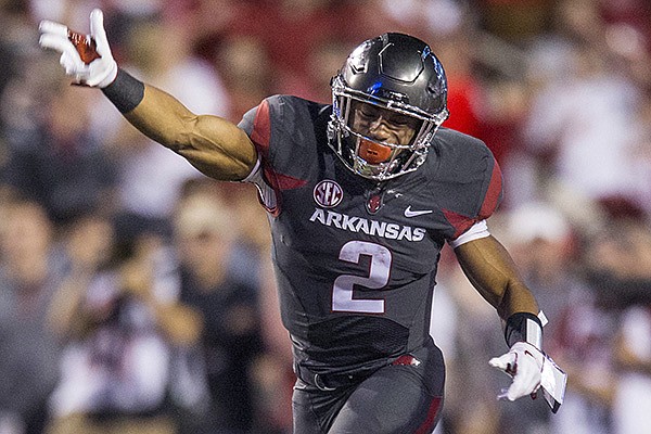 Arkansas running back Chase Hayden signals first down during a game against Auburn on Saturday, Oct. 21, 2017, in Fayetteville. 