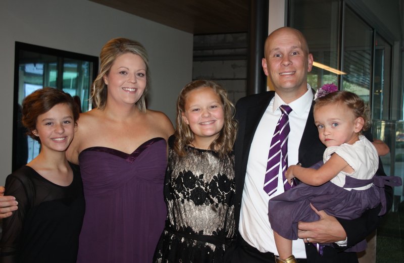 NWA Democrat-Gazette/CARIN SCHOPPMEYER Valarie and Justin Sappington, with their daughters Abbie (from left), Lauren and Hadley, are the March of Dimes Ambassador Family at the Signature Chefs Auction of Northwest Arkansas on Oct. 12 at Brightwater in Bentonville.