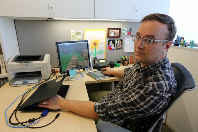 Mark Barnes, a professor at the University of Arkansas-Pulaski Technical College, uses the video game Minecraft to demonstrate urban planning to people in other countries.