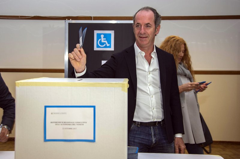 President of Veneto Region, Luca Zaia casts his ballot for a referendum in San Vendemiano, near Treviso, Italy, Sunday, Oct.22, 2017.