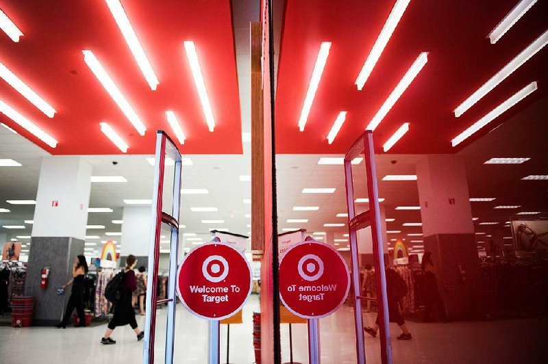 The Target Corp. logo marks a door at City Point mall in Brooklyn in this file photo. Target said it will keep an emphasis on Thanksgiving leading up to the holiday in response to customer concerns about “Christmas creep.”