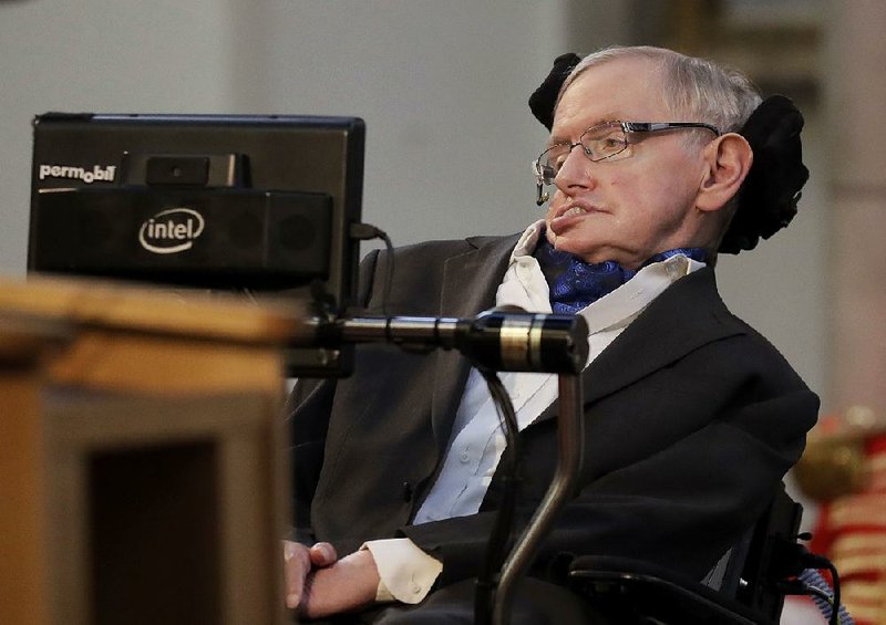 In this Monday, March 6, 2017 file photo, Britain's Professor Stephen Hawking receives the Honorary Freedom of the City of London during a ceremony at the Guildhall in the City of London.