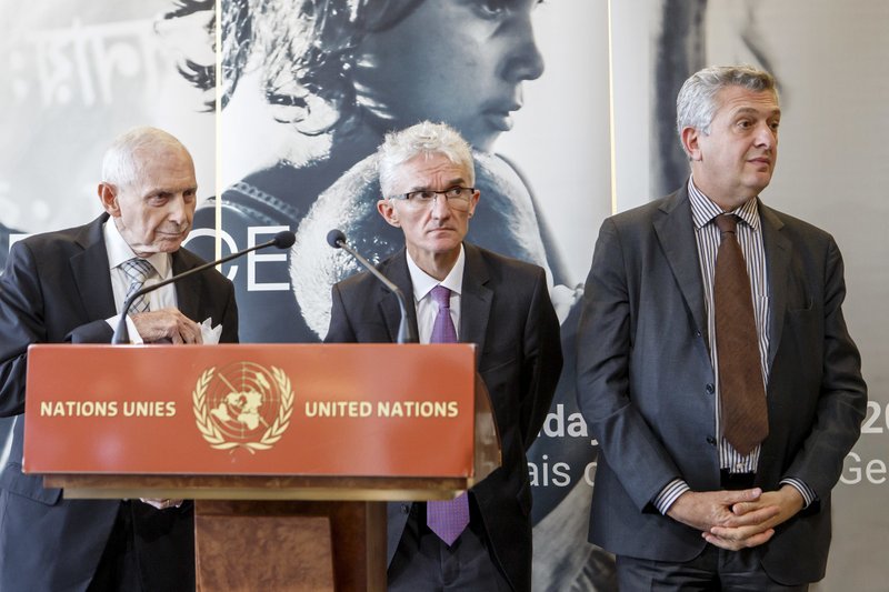 U.S. William Lacy Swing, left, Director General of the International Organization for Migration, IOM, Mark Lowcock, center, U.N. Emergency Relief Coordinator, and U.N. High Commissioner for Refugees, UNHCR, Italian Filippo Grandi, right, listen to a journalist's question, during a press briefing after the Pledging Conference for the Rohingya Refugee Crisis, at the European headquarters of the United Nations in Geneva, Switzerland, Monday, Oct. 23, 2017. 