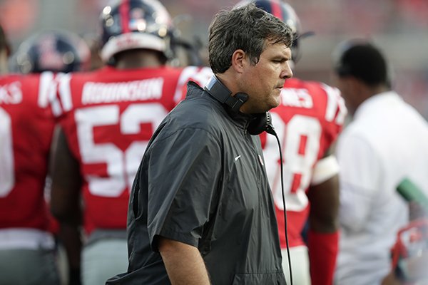 Mississippi head coach Matt Luke scowls as he walks past his team during their game against Vanderbilt, in the second half of the NCAA college football game in Oxford, Miss., Saturday, Oct. 14, 2017. Mississippi won 57-35. (AP Photo/Rogelio V. Solis)

