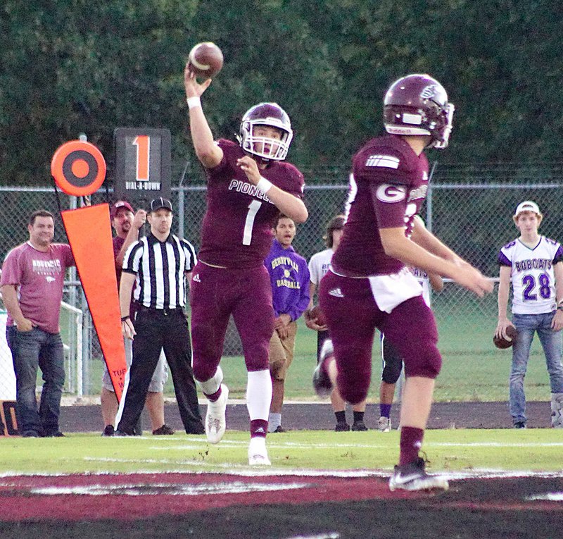 File Photo by Randy Moll Jon Falkenberry, Gentry quarterback, throws the ball to Tanner Christie in first-quarter play of the Gentry-Berryville game earlier this season.