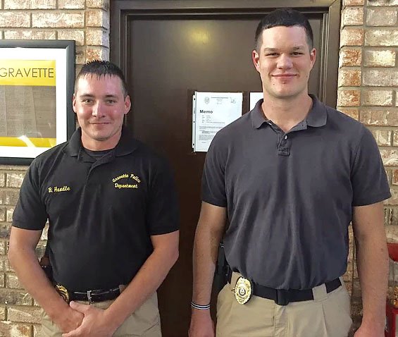 Submitted Photo Detective Braxton Handle (left) and Sergeant Chris Kelley are pictured above.