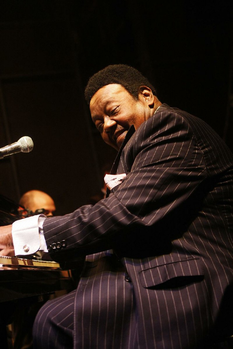 Fats Domino, shown in 2007, broke into the white pop charts in 1955 with “Ain’t it a Shame,” and a string of hits followed into the early 1960s, including “Be My Guest” and “I’m Ready.”