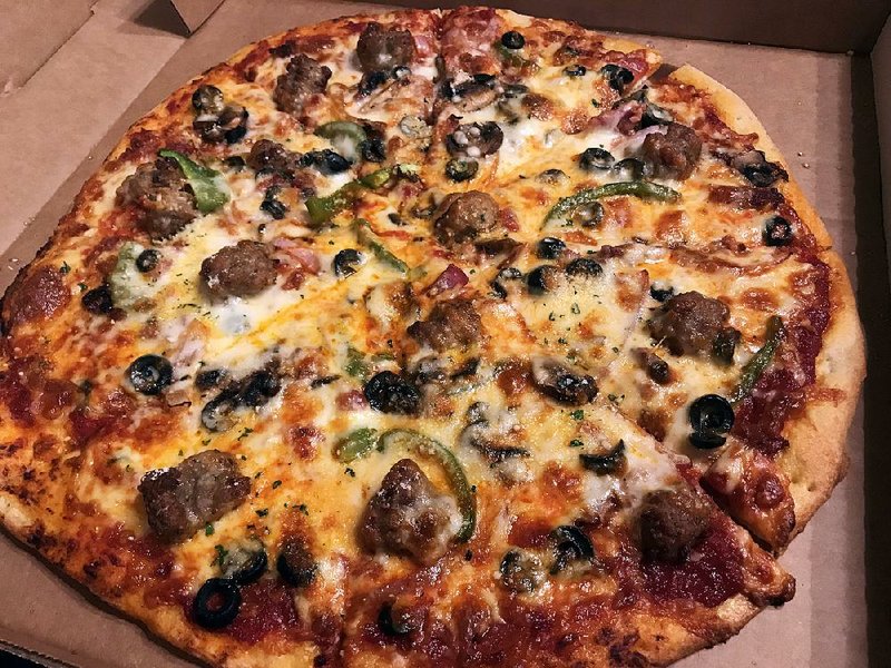 Pizzas, such as the Cocina Supreme, are new to the Vesuvio Bistro menu.