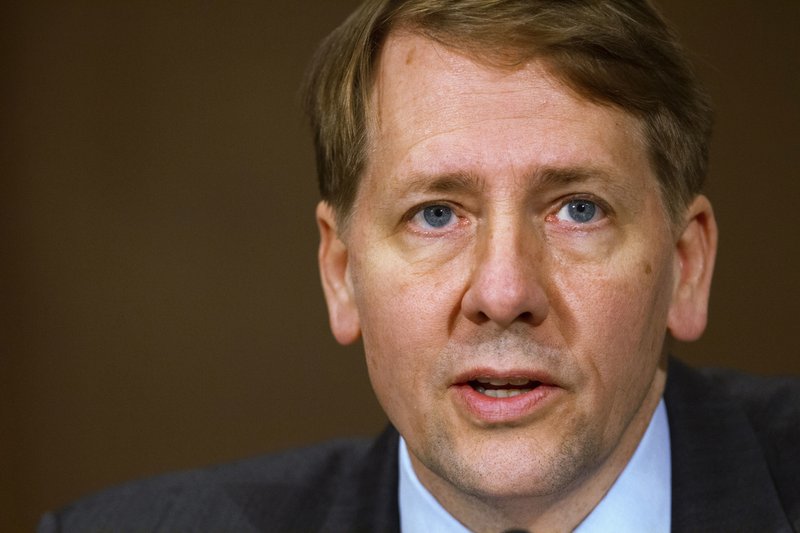 FILE - In this Nov. 12, 2013, file photo, Consumer Financial Protection Bureau Director Richard Cordray testifies before a Senate Committee on Banking hearing on Capitol Hill in Washington. Congressional Republicans and President Donald Trump handed Wall Street banks one of its biggest victories in a decade on Tuesday, Oct. 24, 2017, effectively killing off a politically popular rule that would have allowed consumers to band together to sue their banks when harmed.  (AP Photo/Jacquelyn Martin, File)