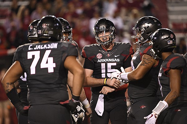Arkansas quarterback Cole Kelley (15) calls a play to run against Auburn during the second half of an NCAA college football game in Fayetteville, Ark., Saturday, Oct. 21, 2017. (AP Photo/Michael Woods)
Arkansas quarterback Cole Kelley (15) calls a play to run against Auburn during the second half of an NCAA college football game in Fayetteville, Ark., Saturday, Oct. 21, 2017. (AP Photo/Michael Woods)