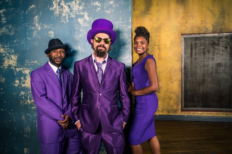 Courtesy Photo Secret Agent 23 Skidoo, center, also known as Joel "Cactus" Sullivan, spent his 20s touring as a rapper. He's still on the road, but his audiences have changed. Now he puts words to beats for kids and families.