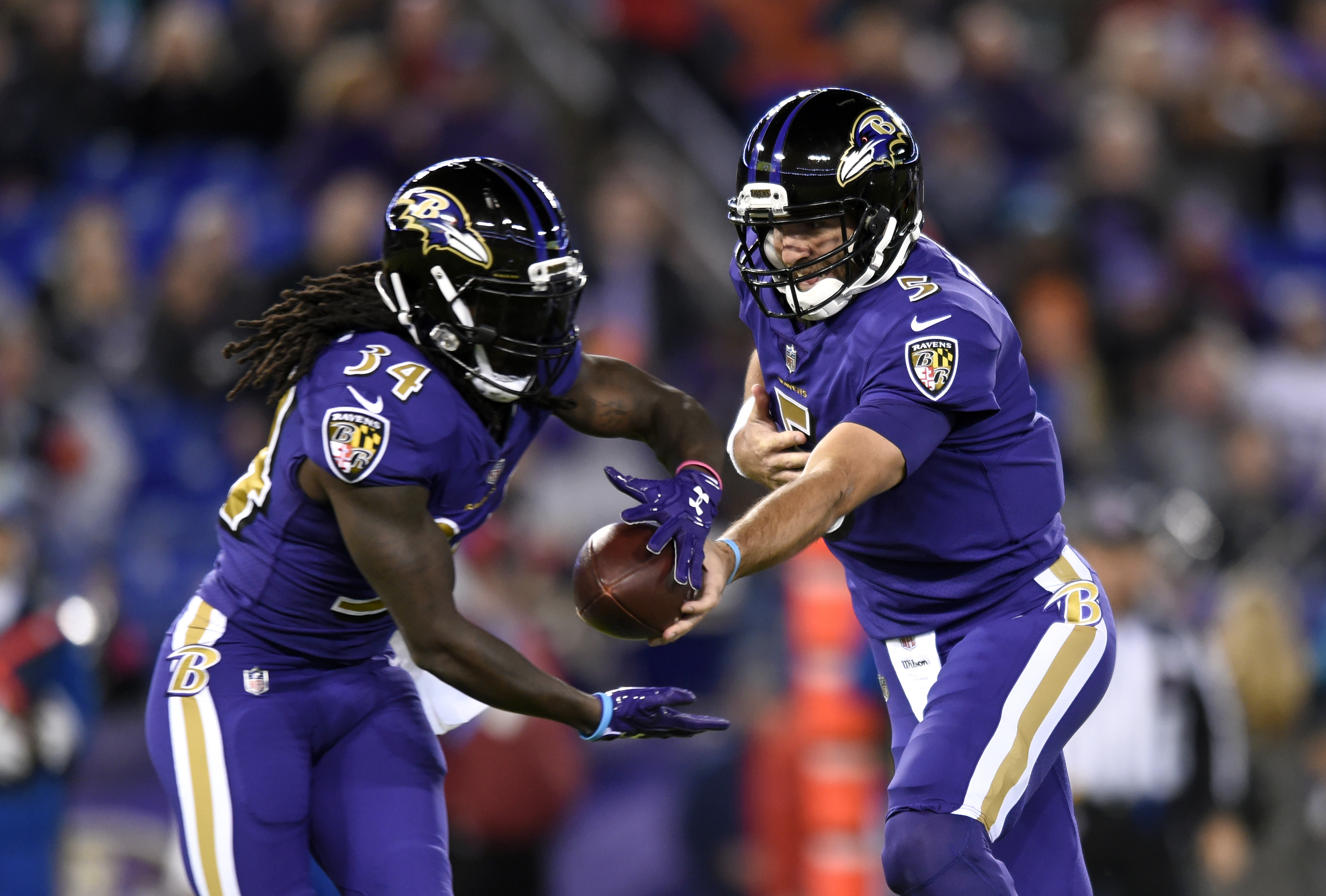 Baltimore Ravens rout Miami Dolphins but lose Joe Flacco 