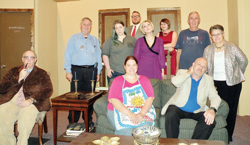 The Maumelle Players will present Rumors, by Neil Simon, Friday through Nov. 12 at the Shepherd of Peace Lutheran Church in Maumelle. Cast members are, front row, from left, Jerry Green as Ernie Cusack, Jennifer Walker as Cookie Cusack and Jeff Riggs as Lenny Ganz; middle row, Bill Lamb as Officer Pudney, Rhiannon Bax as Officer Welch, Erica Monday as Claire Ganz, Mike Crosson as Ken Gorman and Peggy Cromwell as Chris Gorman; and back row, Brian Tynes as Glenn Cooper and Holly Davis as Cassie Cooper.