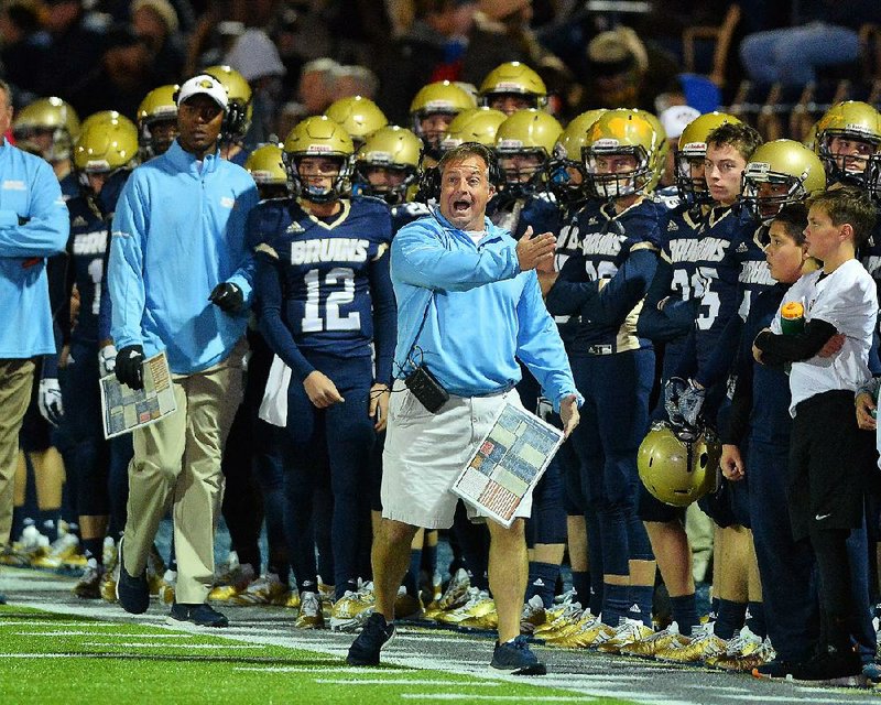 Pulaski Academy head coach Kevin Kelley (center) shouts instructions to his players during Friday night's game against McClellan at Joe B. Hatcher stadium in Little Rock.

Special to the Democrat-Gazette/JIMMY JONES