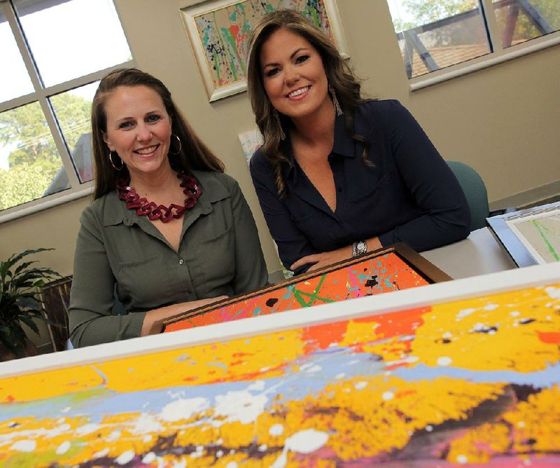 Artists Erin Dees (left) and Emily Cobb are teaming up for Art & Soul, the Thursday fundraiser for Easterseals Arkansas. Works of art will be for sale that were created by adults in the organization’s Artistic Realization Technologies Program. 