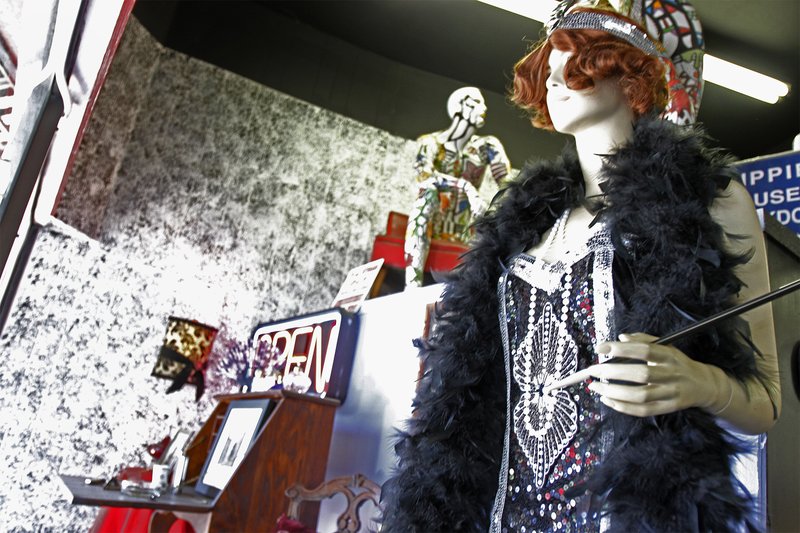 The storefront display for Oddities, Novelties and More recreates how the Madam's room looked when the building was still known as The Crystal Hotel along with a mannequin of how Madam Betty Fortenberry may have looked while working. Terrance Armstard/News-Times