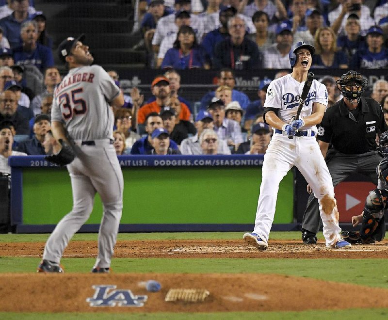 Corey Seager celebrates after a two-run home run off Astros starting pitcher Justin Verlander during the sixth inning of Game 2 of the World Series. The two teams have already broken the World Series record of 21 that was set in 2002 between the Angels and Giants.