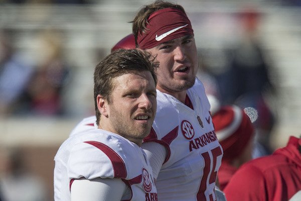 Austin Allen (8) and Cole Kelley, Arkansas quarterbacks, warm up before the game against Ole Miss Saturday, Oct. 28, 2017, at Vaught-Hemingway Stadium in Oxford, Miss. 
