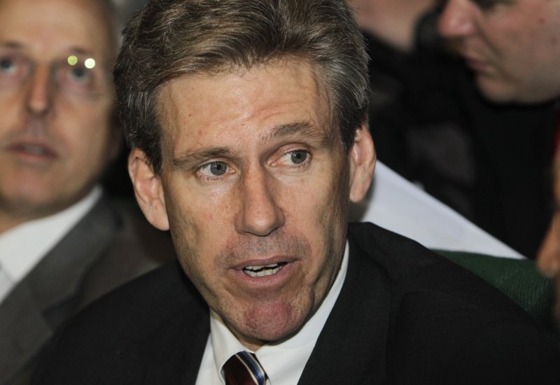 In this April 11, 2011 file photo, then-U.S. envoy Chris Stevens attends meetings at the Tibesty Hotel in Benghazi, Libya. U.S. special operations forces captured a militant in Libya accused of playing an instrumental role in the Benghazi attacks, officials said Oct. 30, 2017, in a high-stakes operation designed to bring the perpetrators to justice more than five years after the deadly violence. 
