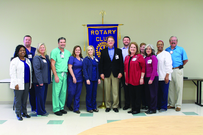 Hospital officials: The lead nursing staff of the Medical Center of South Arkansas educated the Rotary Club about the special services each department does at the hospital Monday. From left, Semekia Amerison, Jared Cater, Shelby Cater, Clint Gathright, Alison Stone, Sonya Justice, CEO Scott Street, Justin Brewer, Amy Triplet, Rachel Wigley, Elizabeth Damers, Angela Smith and Art Noyes.
