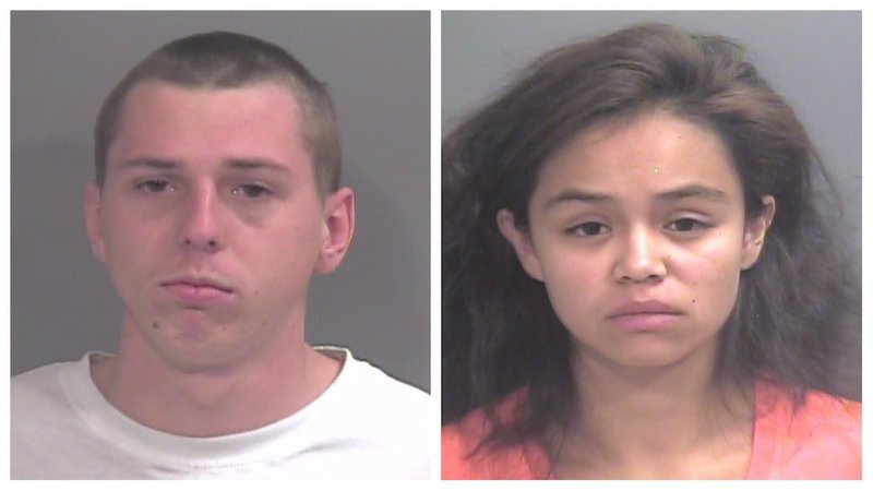 Tyler Hobbs, 21, of Farmington (left) and Maria Giron-Molina, 21, of Decatur