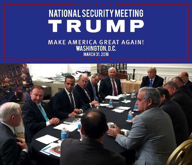 George Papadopoulos (facing, third from left) takes part in a meeting on national security with then-candidate Donald Trump and others in Washington in this photo tweeted by Trump on March 31, 2016. Trump named Papadopoulos as one of five foreign-policy advisers at the time and described him as an “excellent guy.” 
