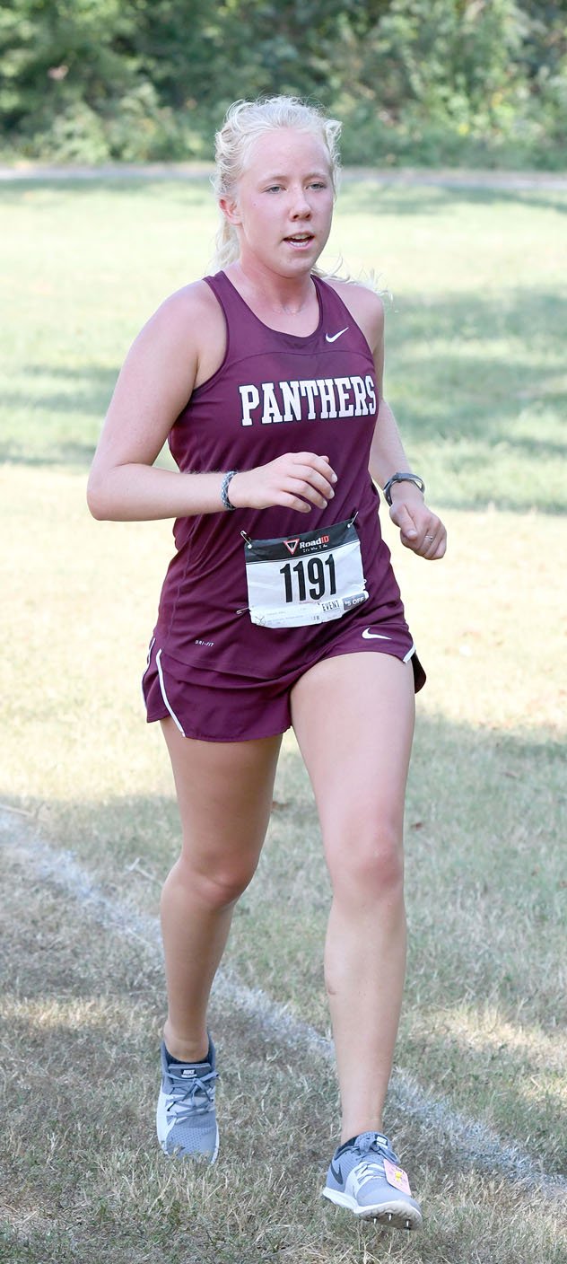 Bud Sullins/Special to the Herald-Leader Siloam Springs senior Allika Pearson hopes to lead the Lady Panthers to their fourth straight Class 6A cross country championship on Friday at Oaklawn Park in Hot Springs.