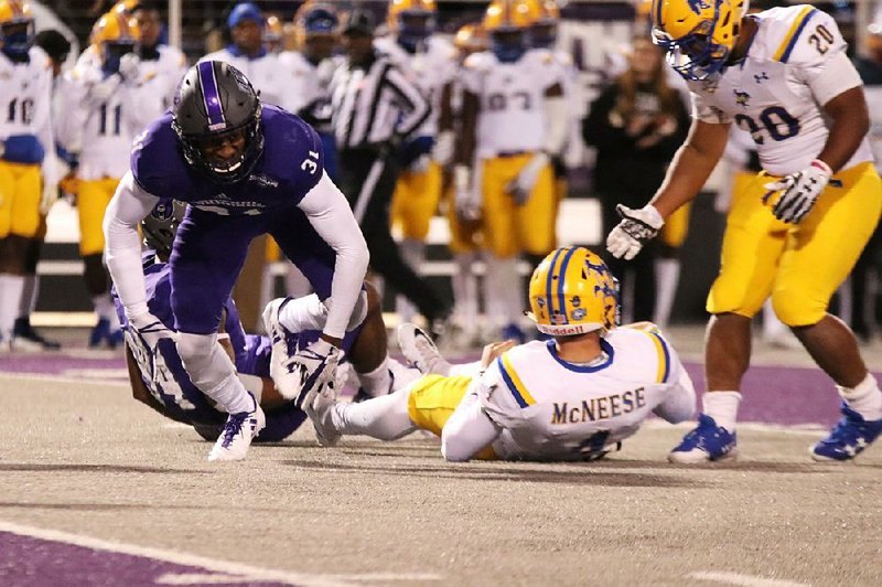 University of Central Arkansas senior linebacker George Odum (left) helped the Bears limit McNeese State to 17 points in Saturday’s victory at Estes Stadium in Conway. 