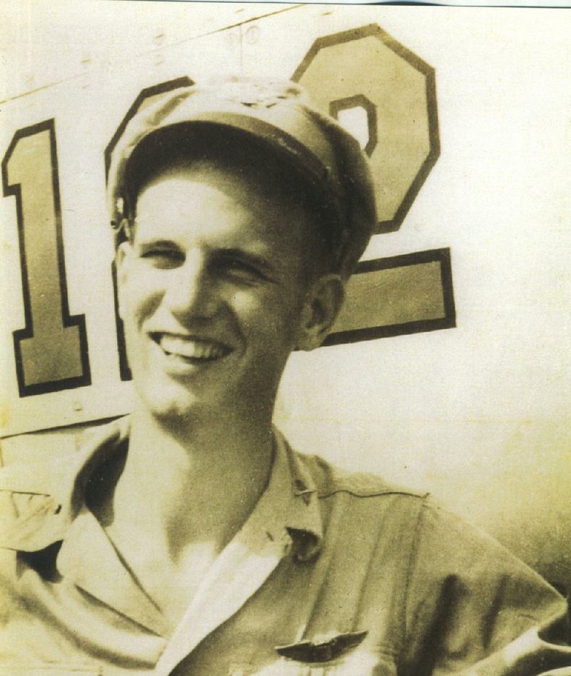 Floyd Fulkerson is shown here from his days as a World War II pilot. He was shot down over the Philippines on Christmas Day 1944.