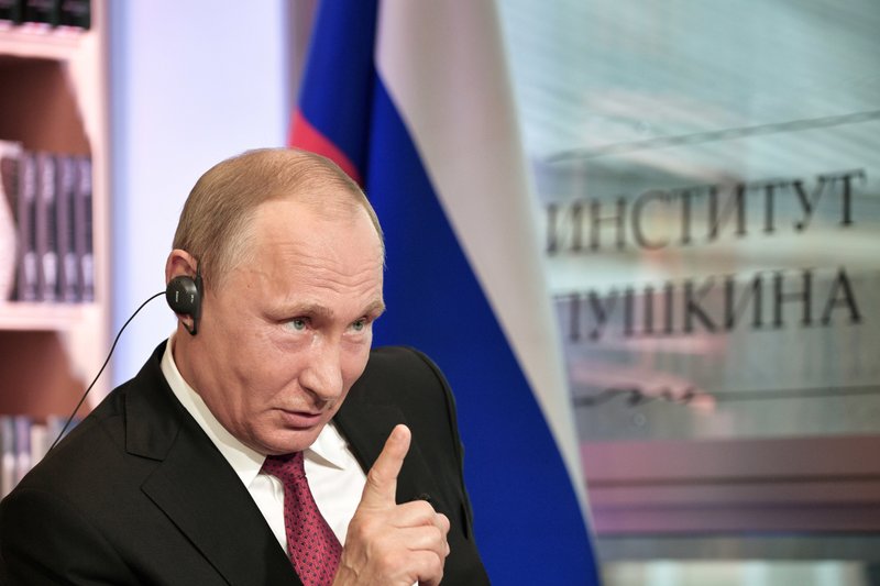 FILE - In this Monday, May 29, 2017 photo released by the Sputnik news agency, Russian President Vladimir Putin speaks during an interview in Paris, France. On Thursday, June 1, 2017, Putin told reporters, Russian hackers might &#x201c;wake up, read about something going on in interstate relations and, if they have patriotic leanings, they may try to add their contribution to the fight against those who speak badly about Russia.&#x201d; Putin added that &#x201c;we never engaged in that on a state level,&#x201d; a statement which left open the possibility of other forms of engagement, for example through contractors. (Alexei Nikolsky/Sputnik, Kremlin Pool Photo via AP)