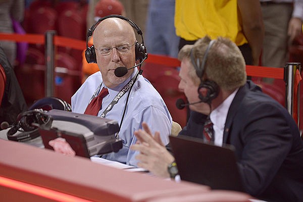 Arkansas basketball play-by-play announcer Chuck Barrett, left, and color analyst Matt Zimmerman talk during a game against Ole Miss on Saturday, Feb. 18, 2017, in Fayetteville. 