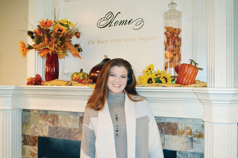 Ashley Blankenship stands in front of the fireplace at Southridge Village Assisted Living in Conway. Blankenship, her mother and sister co-own the facility, as well as three others. She was named chairwoman of the National Center for Assisted Living and will travel six months of the year to educate people about what assisted living is. “It all comes down to, it’s their home,” she said.