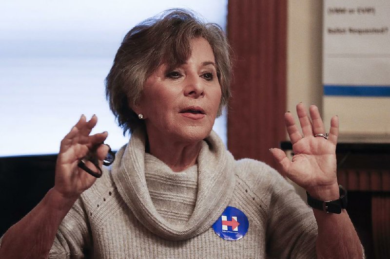 FILE - In this Oct. 29, 2016, file photo, then-Sen. Barbara Boxer, D-Calif., speaks to volunteers at a home serving as a canvassing site to train and organize supporters of Democratic presidential candidate Hillary Clinton in Cincinnati. 