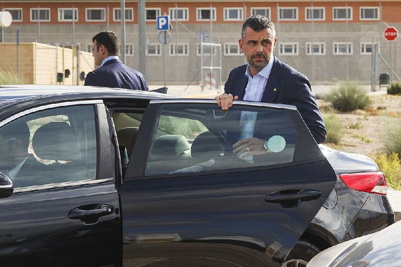 Santi Vila, the Catalan ex-regional minister for business, leaves a Spanish prison Friday in Madrid after posting bail. “I ask for all political parties across Spain, appealing to their democratic values, to put an end to this terrible situation that has put politicians in prison,” Vila said as he left the Estremera prison. 