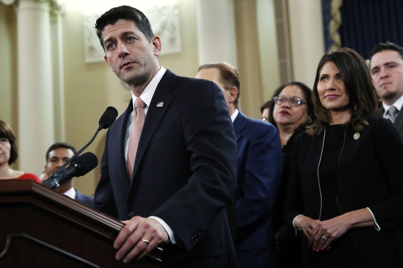 House Speaker Paul Ryan of Wis., left, speaks next to Rep. Kristi Noem, R-S.D., during a news conference announcing GOP tax legislation, Thursday, Nov. 2, 2017, on Capitol Hill in Washington. (AP Photo/Jacquelyn Martin)