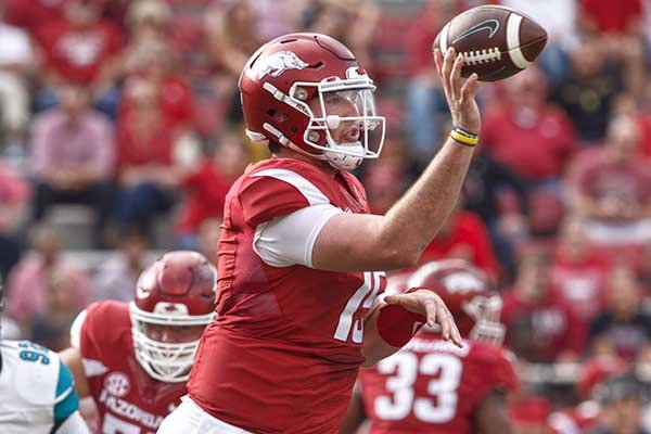Arkansas quarterback Cole Kelley throws a pass during a game against Coastal Carolina on Saturday, Nov. 4, 2017, in Fayetteville. 