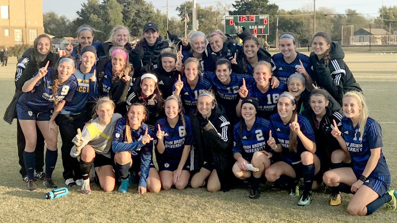 Photo courtesy of JBU Sports Information John Brown University's women's soccer team huddled for a group photo Tuesday after defeating Science and Arts (Okla.) 1-0 in Chickasha, Okla., to capture their second straight Sooner Athletic Conference regular season championship.