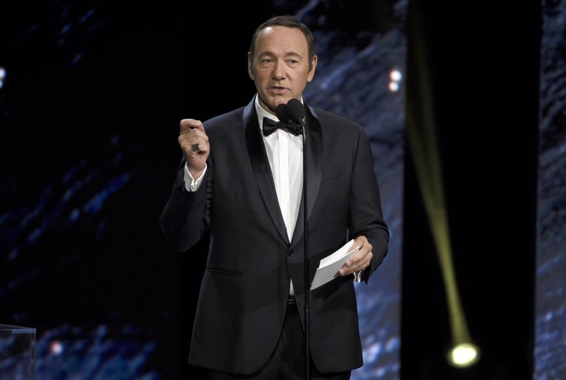 FILE - In this Oct. 27, 2017 photo, Kevin Spacey presents the award for excellence in television at the BAFTA Los Angeles Britannia Awards at the Beverly Hilton Hotel in Beverly Hills, Calif. British media reported Friday, Nov. 3, that London police are investigating Spacey over an alleged 2008 assault. Police declined to name Spacey as the subject of the investigation, but confirmed they are looking into a 2008 incident in Lambeth that several British media outlets say involved Spacey, who has been accused of sexual harassment by several men in recent days. (Photo by Chris Pizzello/Invision/AP, File)