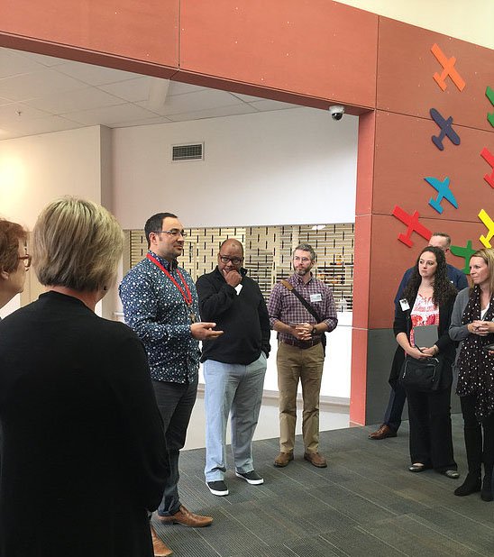 Daniel Birch, principal of Hobsonville Point Primary School in Auckland, New Zealand, speaks to a group of Arkansas educators visiting his school last month. The group of mostly teachers and school administrators traveled to New Zealand to tour schools and learn more about the country's educational system.