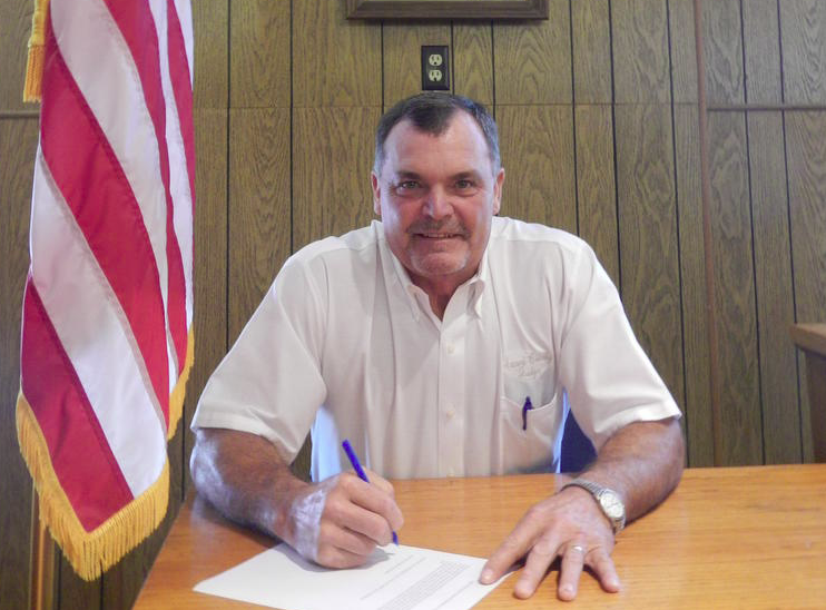 David Charles Sherrell signs an order in June of 2016. At the time, he was serving as Izard County judge.