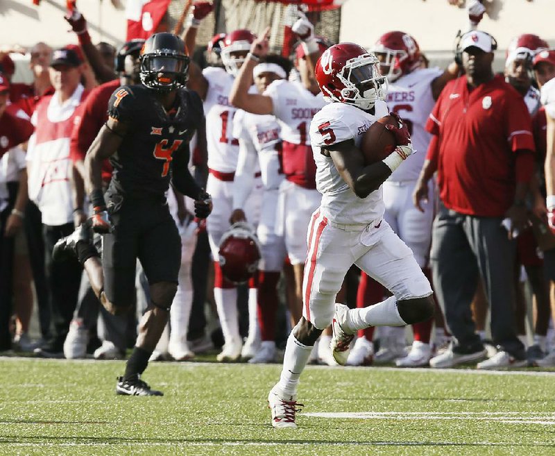 Oklahoma wide receiver Marquise Brown (5) had 265 yards receiving in a 62-52 victory over Oklahoma State on Saturday. Brown leads the No. 5 Sooners with 743 yards receiving this season.