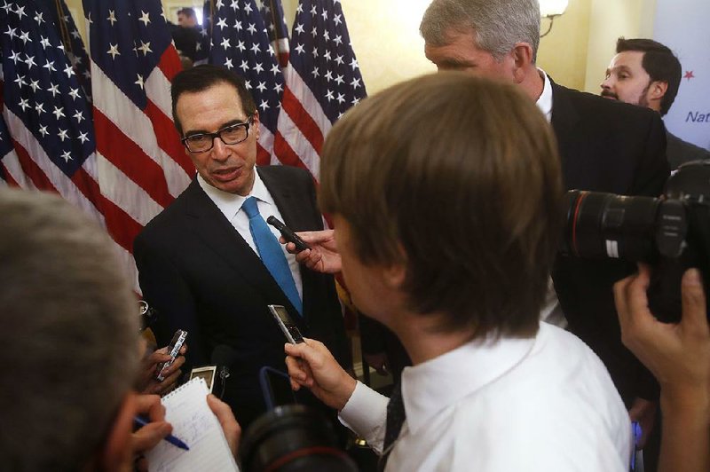 Treasury Secretary Steven Mnuchin brushed aside questions Tuesday about whether a tax bill without a repeal of the individual mandate for health care insurance would be acceptable. 